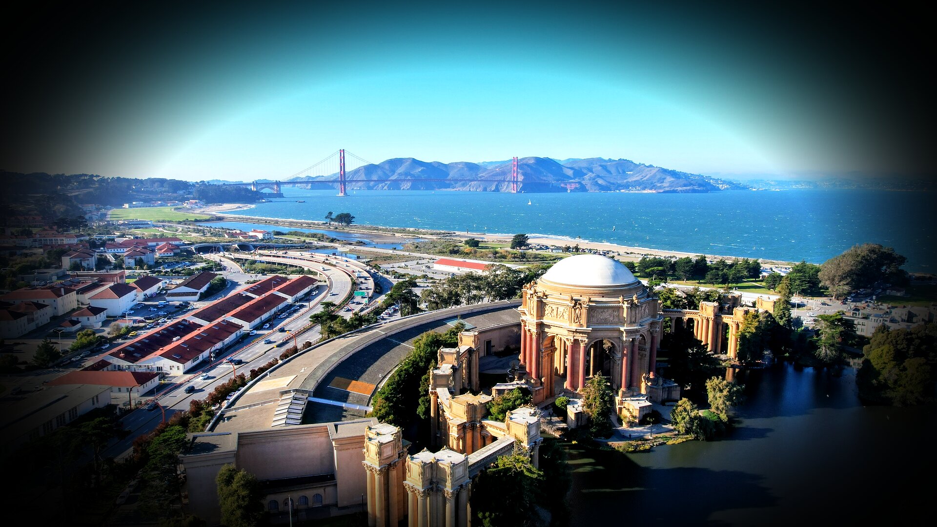 Aerial view of Palace of Fine Arts with Golden Gate Bridge, San Francisco