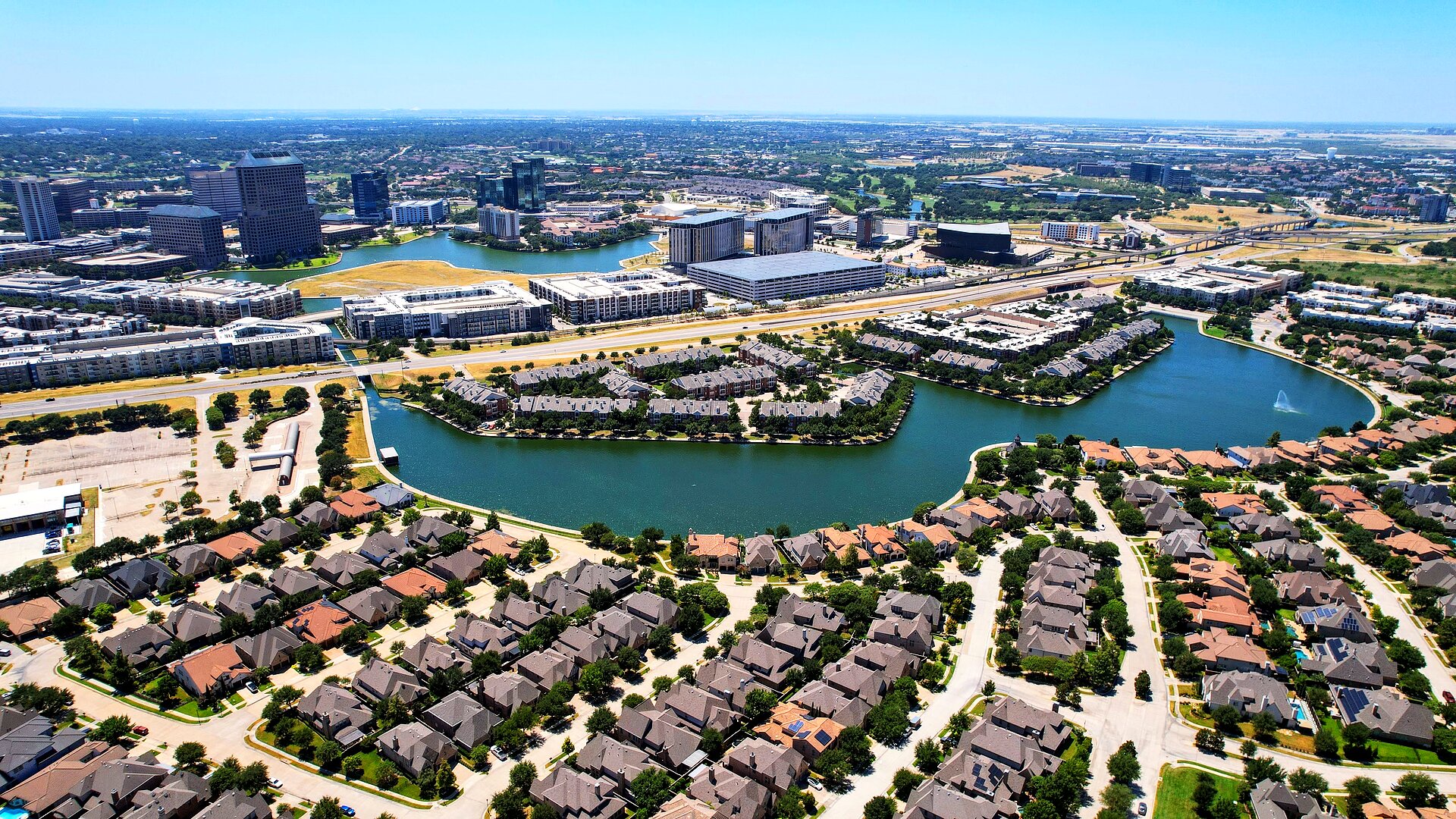 Aerial view of Las Colinas neighborhood and lake, Irving TX